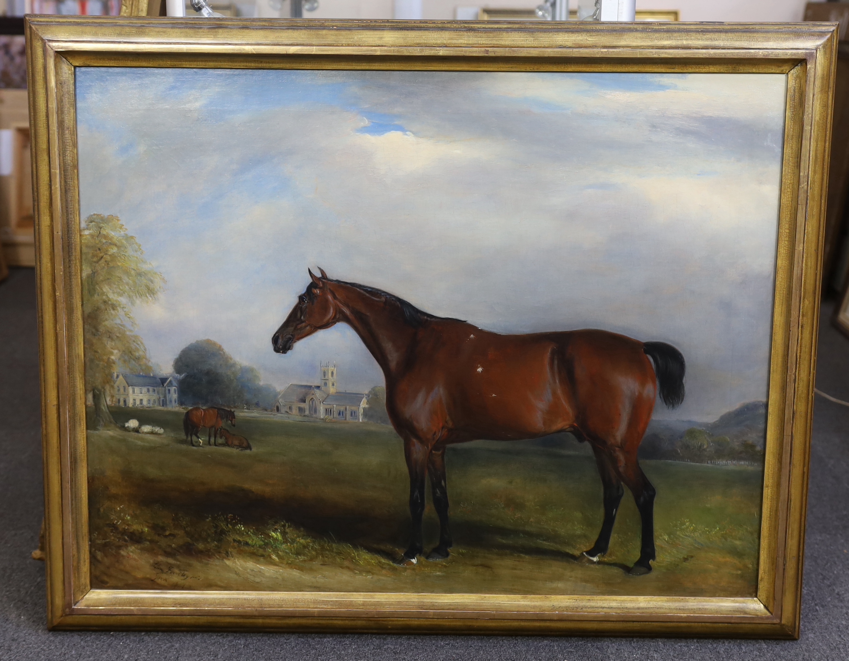 John E. Ferneley Jnr (British, 1815-1862), Portrait of a bay horse in a landscape, a church and country house beyond, oil on canvas, 70 x 90cm
